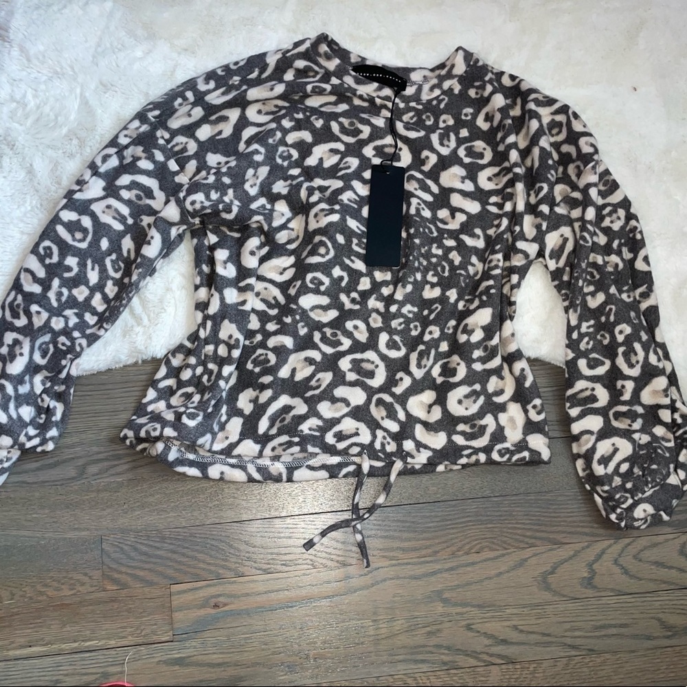 Know. One. Cares. Cheetah print sweater